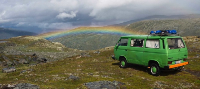 T3 Syncro on mountains with rainbow Vanlife